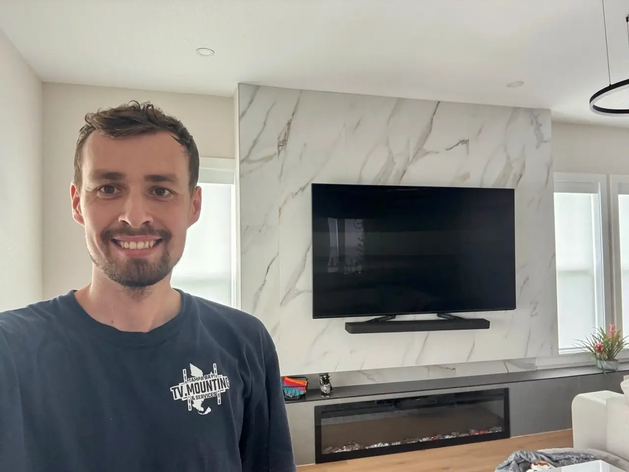 Luxury TV wall mounting project near Land o Lakes modern interior