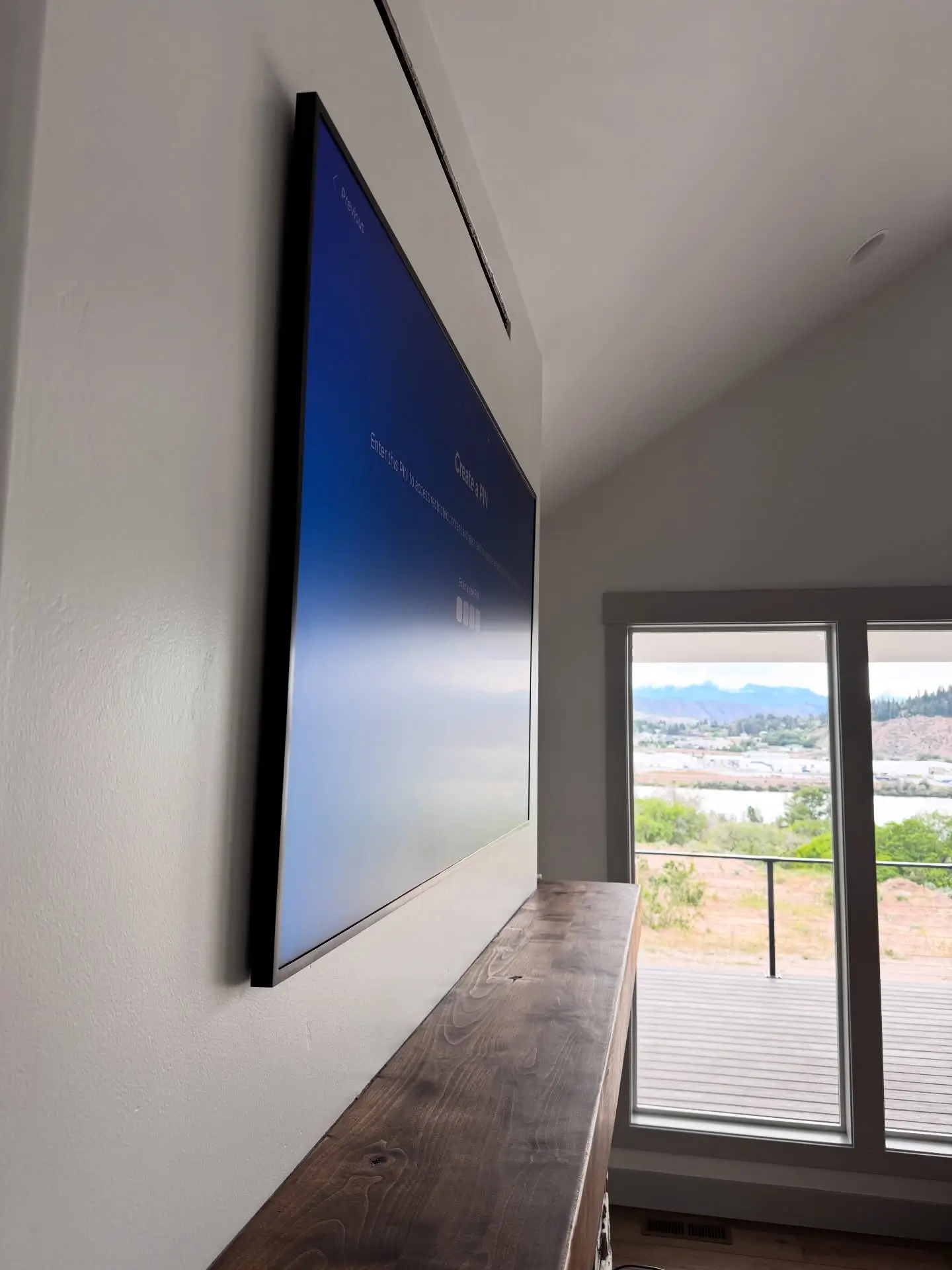 No-gap Samsung Frame TV above fireplace
