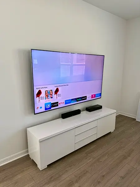 TV mounting service for a TV stand setup